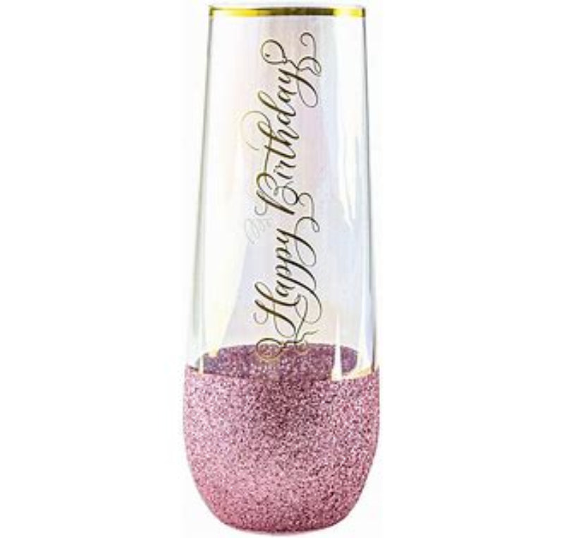 Clear glass with pink glitter base and 'Happy Birthday' text on a white background