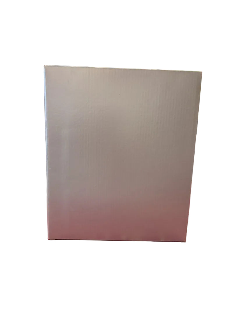 White box on a red surface with a blurred store interior in the background