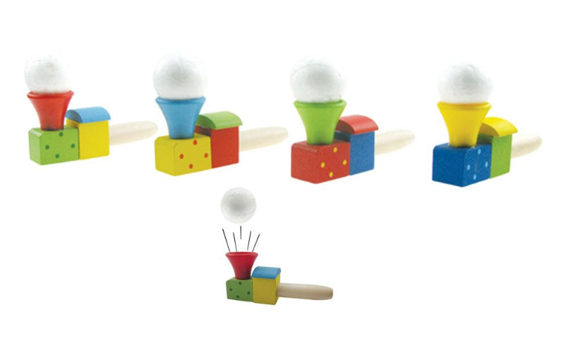 Colorful toy balancing blocks with balloons on a white background