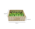 Box of green candles with dimensions labeled on a white background
