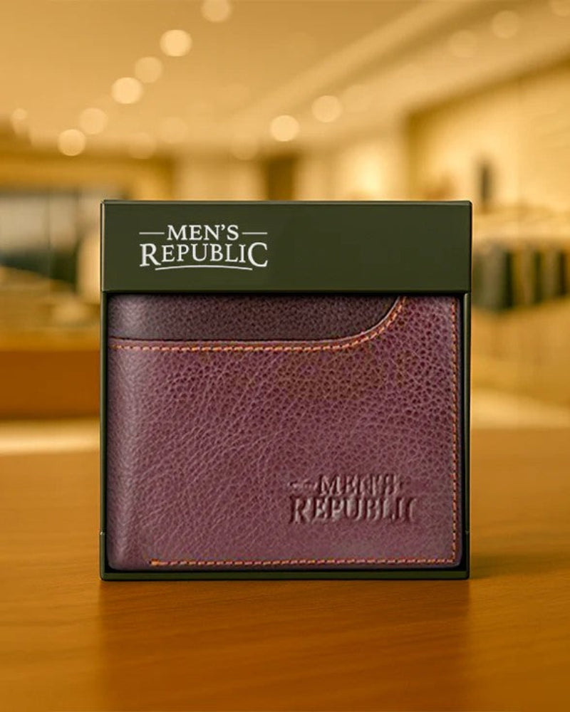 Purple leather wallet with 'Men's Republic' branding on a wooden surface.
