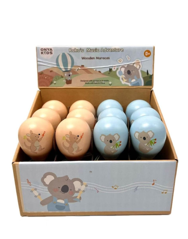 Box of wooden maracas with animal designs on a white background