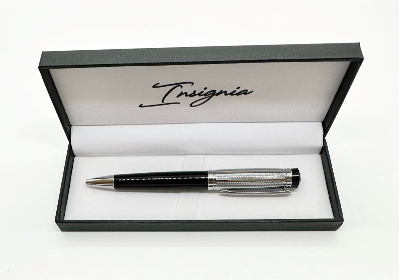 Pen in a 'Tinsignia' branded box on a white background