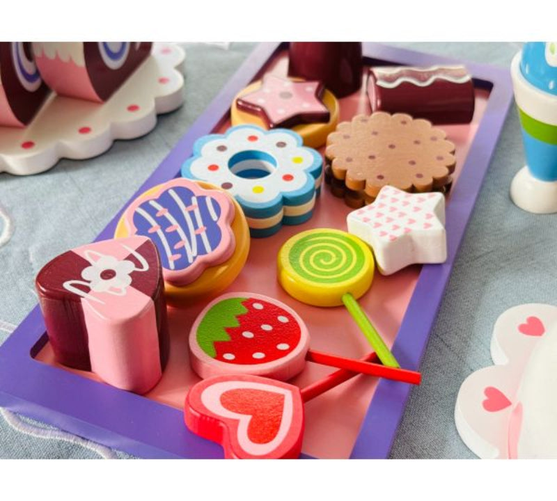 Colorful wooden toy set on a tray with various shapes and designs.